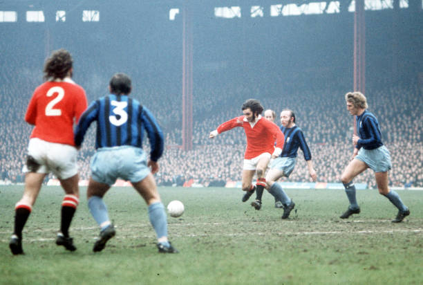 Football, 26th February Manchester United+s George Best is closely marked by Middlesborough's Nobby Stiles