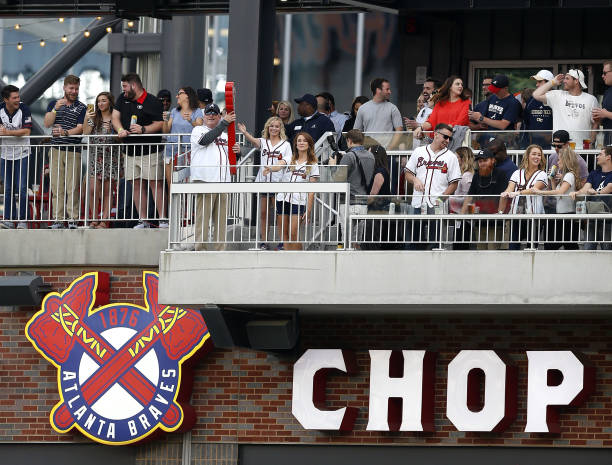 Former Atlanta Braves player Bob Horner performs the ceremonial first chop in the first inning of the game between the Atlanta Braves and the New...