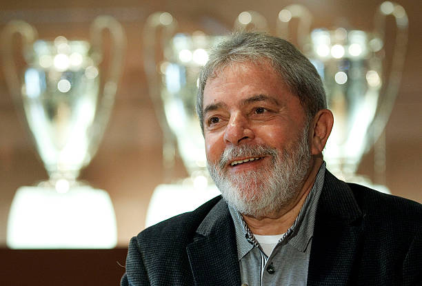 Former Brazilian President Lula da Silva smiles during a visit to the Estadio Santiago Bernabeu on April 16 2011 in Madrid Spain