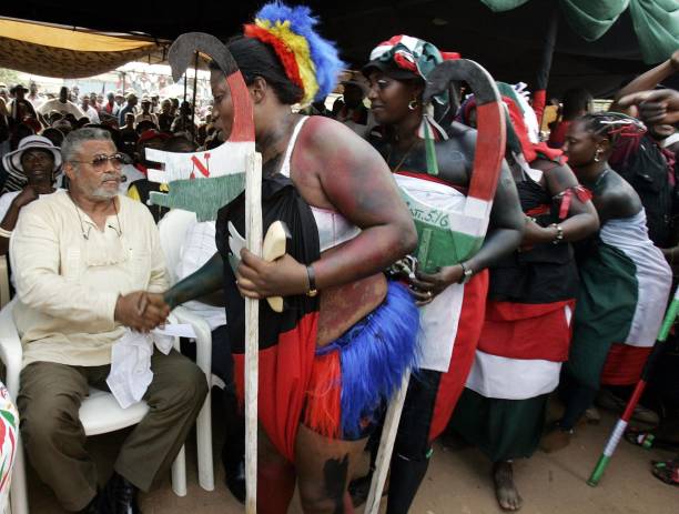 Former Ghanaian President Jerry Rawlings is greeted by NDC supporters during a meeting of NDC leader and Presidential candidate John Atta Mills 04...