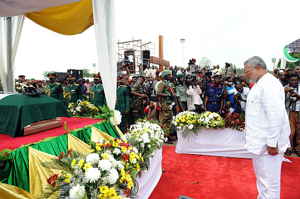 Former Ghanaian President Jerry Rawlings pays rest to Nigeria's seccessionist leader Odumegwu Ojukwu during the national interdenominational funeral...