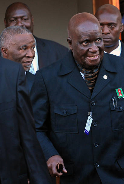 Former president of Zambia Kenneth Kaunda gestures prior to attend a gala dinner in Bloemfontein on January 7 2012 South Africa's mighty African...