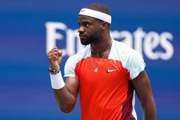 Frances Tiafoe of the United States reacts to a point against Rafael Nadal of Spain during their Men’s Singles Fourth Round match on Day Eight of the...