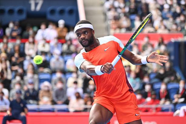 Frances Tiafoe of the US returns a shot against Kwon Soon-woo of South Korea during their men's singles semi final match at the Japan Open tennis...