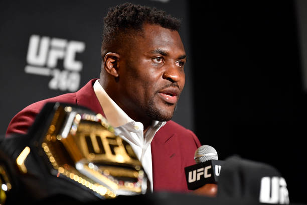 Francis Ngannou of Cameroon interacts with media after his victory over Stipe Miocic during the UFC 260 event at UFC APEX on March 27, 2021 in Las...