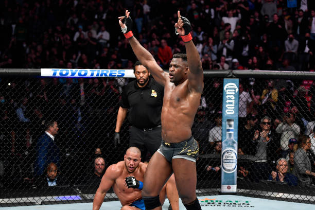 Francis Ngannou of Cameroon reacts after his five-round battle against Ciryl Gane of France in their UFC heavyweight championship fight during the...