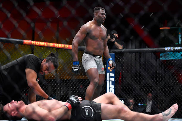 Francis Ngannou of Cameroon reacts after his victory over Stipe Miocic in their UFC heavyweight championship fight during the UFC 260 event at UFC...