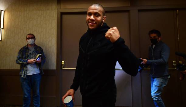 French mixed martial arts fighter Ciryl Gane gestures following a press conference in Anaheim, California on January 19, 2022 ahead of his UFC 270...