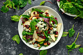 Fresh Pears, Blue Cheese salad with vegetable green mix, walnuts, cranberry. healthy food
