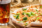 Fresh pizza with broccoli and chicken