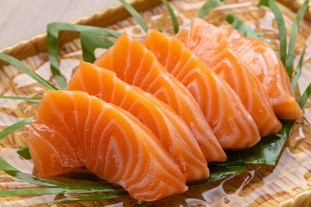 fresh raw salmon on wooden cutting board fresh fish salmon fillet picture id1210255554?k=20&m=1210255554&s=612x612&w=0&h=y8PQPoCz3