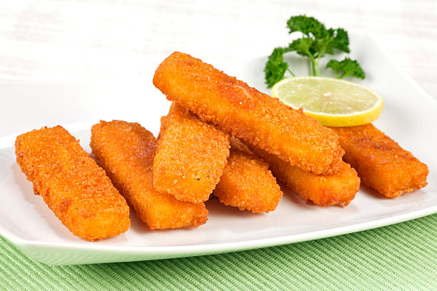 fried fish fingers - fish fingers stock pictures, royalty-free photos & images