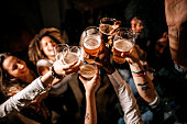 Friends toasting at pub