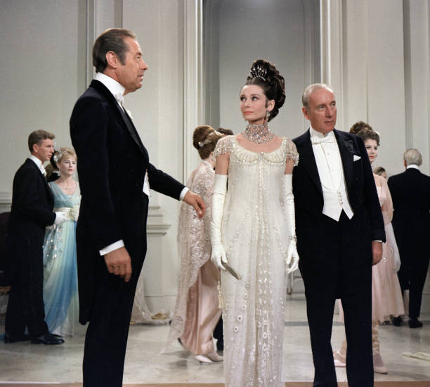From left to right: Rex Harrison as Professor Henry Higgins, Audrey Hepburn as Eliza Doolittle and Wilfrid Hyde-White as Colonel Hugh Pickering in...