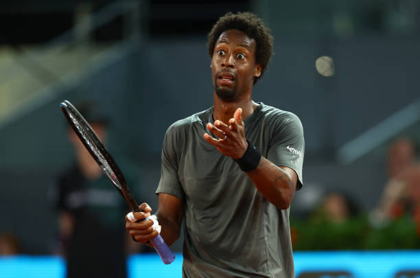 Gael Monfils of France shows his frustration in his second round match against Novak Djokovic of Serbia during day six of the Mutua Madrid Open at La...