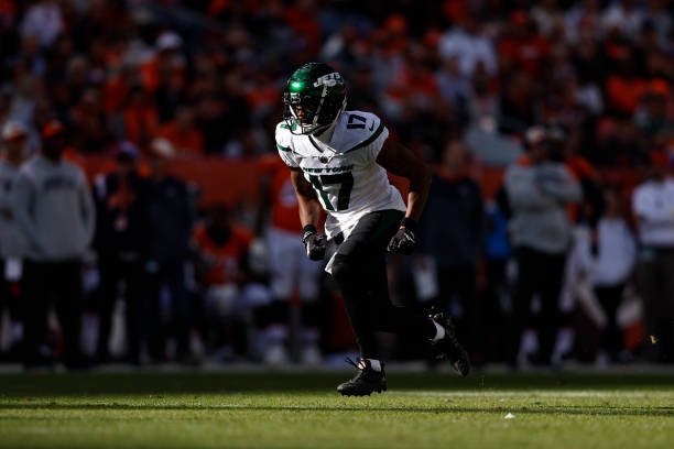 Garrett Wilson of the New York Jets runs a route during a game between the Denver Broncos and the New York Jets at Empower Field At Mile High on...