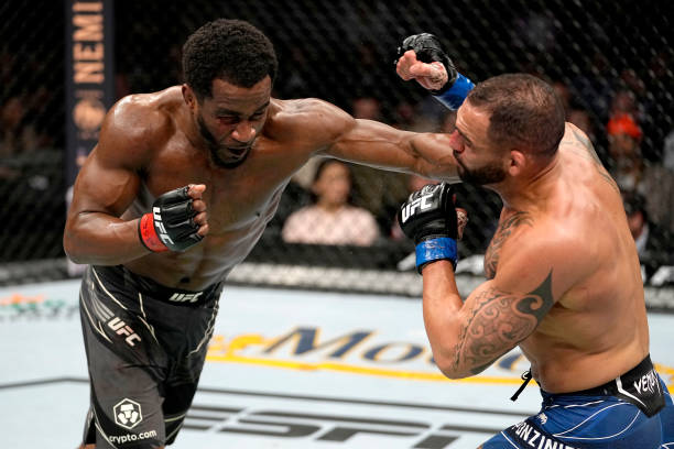 Geoff Neal punches Santiago Ponzinibbio of Argentina during their welterweight bout during the UFC 269 on December 11, 2021 in Las Vegas, Nevada.