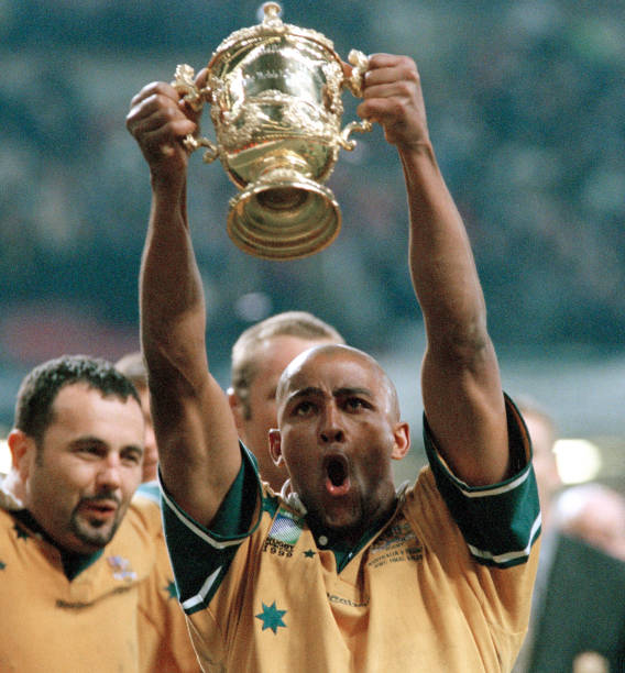 George Gregan of Australia celebrates their 35-12 win against France in the rugby union World Cup final match at the Millennium Stadium in Cardiff on 6th November 1999. (Photo by Professional Sport/Popperfoto via Getty Images/Getty Images)