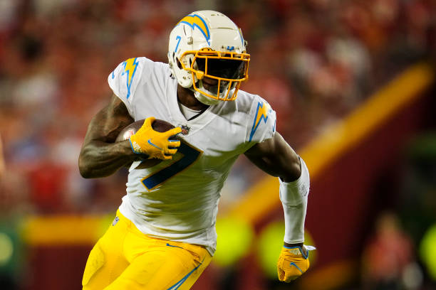 Gerald Everett of the Los Angeles Chargers runs the ball against the Kansas City Chiefs at GEHA Field at Arrowhead Stadium on September 15, 2022 in...