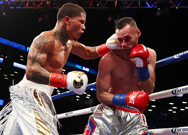 Gervonta Davis punches Jose Pedraza during their IBF Junior Lightweight Championship at the Barclays Center on January 14, 2017 in New York City.