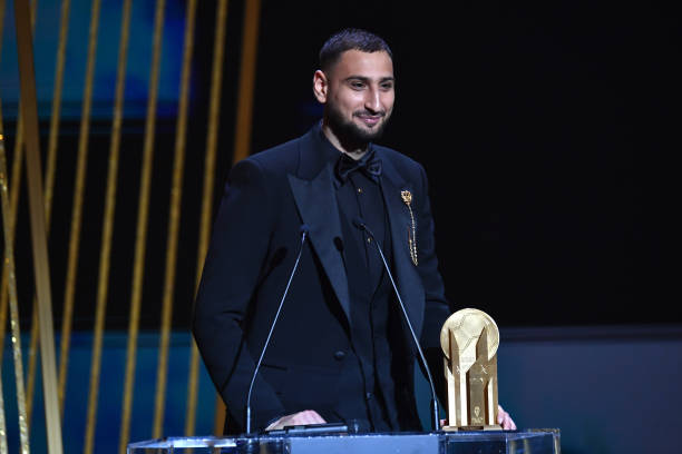 Gianluigi Donnarumma is awarded with the Yachine Goalkeeper Trophy during the Ballon D'Or ceremony at Theatre du Chatelet on November 29, 2021 in...