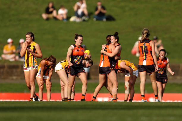 Giants players celebrate at full time during the round eight AFLW match between the Greater Western Sydney Giants and the Hawthorn Hawks at Henson...