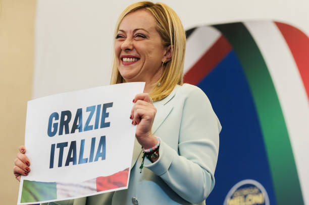 Giorgia Meloni is seen holding a placard quoting "Thanks Italy" in the press room. Giorgia Meloni, leader of the far-right and national-conservative...