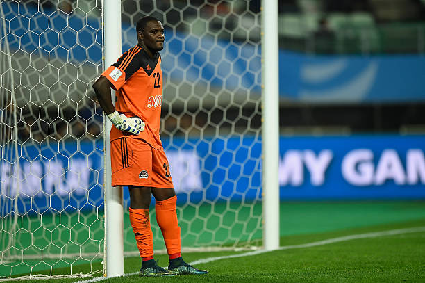 Goalkeeper Sylvain Gbohouo of Mazembe cuts a dejected figure with his team trailing 0-3 during the FIFA Club World Cup Japan 2015 Quarter Final...