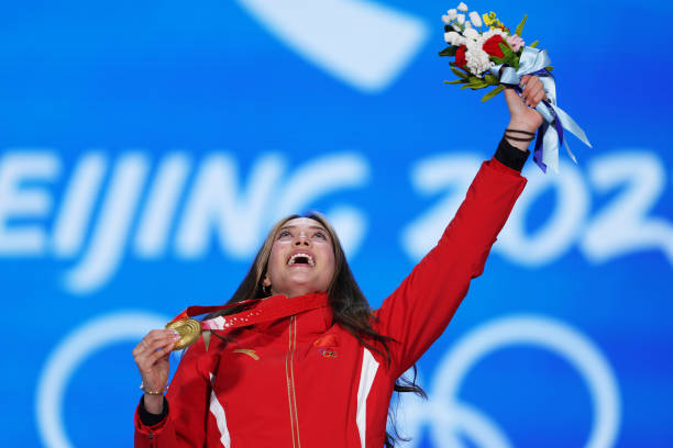 Gold medallist Ailing Eileen Gu of Team China celebrates with their medal during the Women's Freestyle Skiing Freeski Big Air medal ceremony on Day 4...