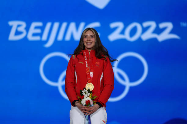 Gold medallist Ailing Eileen Gu of Team China celebrates with their medal during the Women's Freestyle Skiing Freeski Big Air medal ceremony on Day 4...