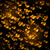 golden hearts dark background abstract background