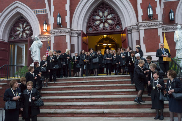 Good Friday church procession travels through the streets on April 19, 2019 in the Carroll Gardens neighborhood of Brooklyn in New York City.