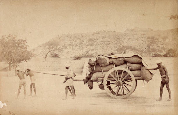 Grain cart drawn by coolies - Madras - Tamil Nadu, India, 1876. Madras Famine 1876-1878.