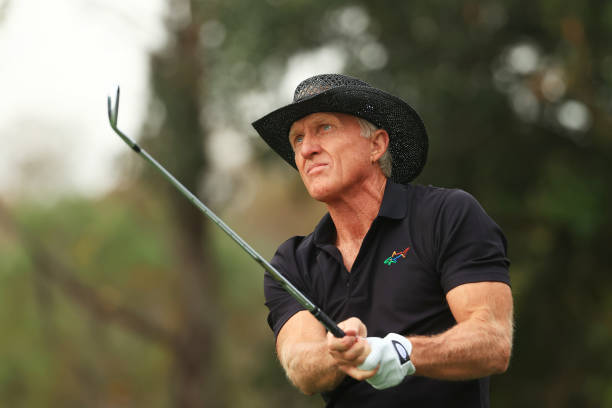Greg Norman of Australia plays his shot from the fourth tee during the final round of the PNC Championship at the Ritz-Carlton Golf Club Orlando on...