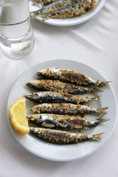 grilled sardines - sardines stock pictures, royalty-free photos & images