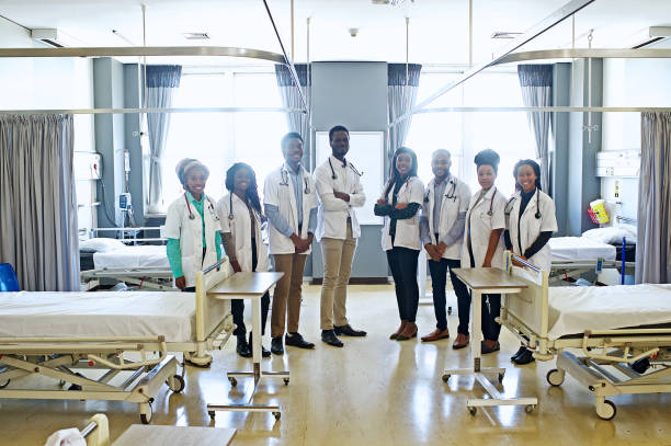 group of african medical students standing in a row in a hospital picture