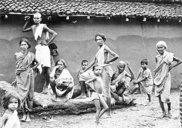 Group of emaciated villagers in the drought-hit district of Bhawanipatna in the Indian state of Orissa, India, 1977.