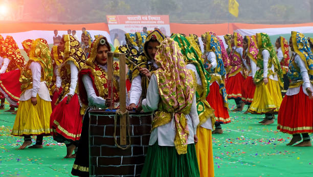 group of traditional indian women dancing together during republic day celebration - haryana dance stock pictures, royalty-free photos & images