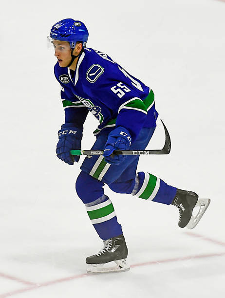 guillaume-brisebois-of-the-utica-comets-skates-up-ice-against-the-picture-id859492816