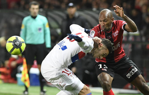 Guingamp's French defender Jeremy Sorbon (R) vies Lyon's French forward Amine Gouiri during the French L1 football match between Guingamp and Lyon at the Roudourou Stadium in Guingamp, western France, on January 17, 2018. /