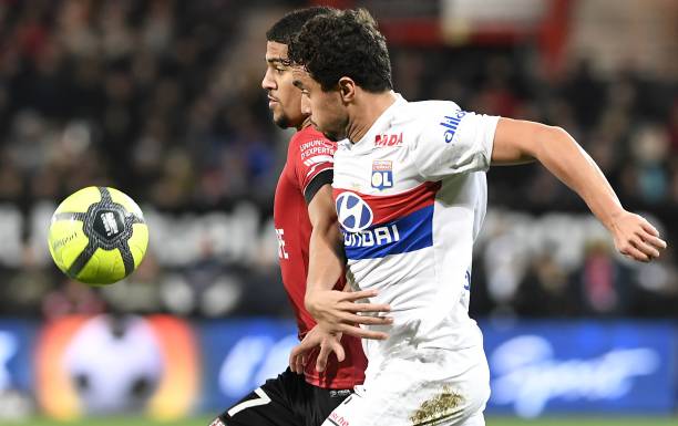 Guingamp's French midfielder Ludovic Blas (L) vies Lyon's Portuguese-Brazilian defender Rafael during the French L1 football match between Guingamp and Lyon at the Roudourou Stadium in Guingamp, western France, on January 17, 2018.
Lyon won the match 0-2. /