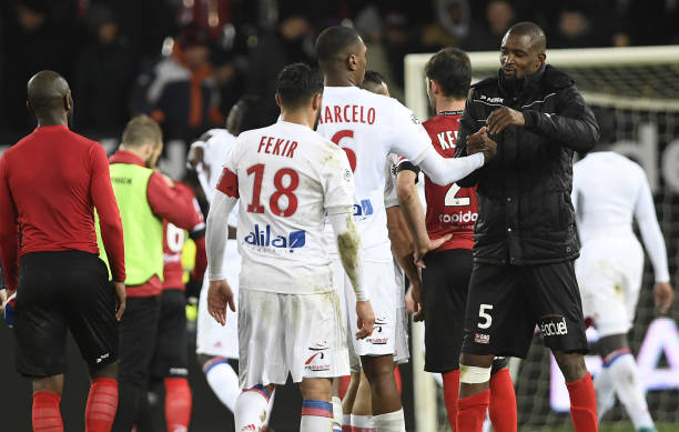 Guingamp's players congratulate Lyon's players at the end of the French L1 football match between Guingamp and Lyon at the Roudourou Stadium in Guingamp, western France, on January 17, 2018.
Lyon won the match 0-2. /