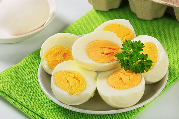 hardboiled eggs on a plate - hard boiled eggs stock pictures, royalty-free photos & images