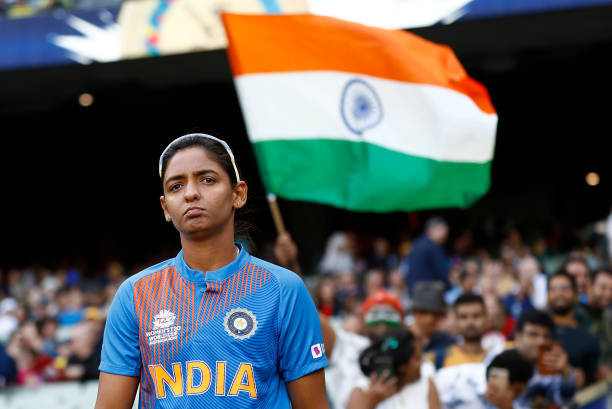 The Hundred - Harmanpreet Kaur of India walks out for the toss during the ICC Women's T20 Cricket World Cup Final match between India and Australia at the...