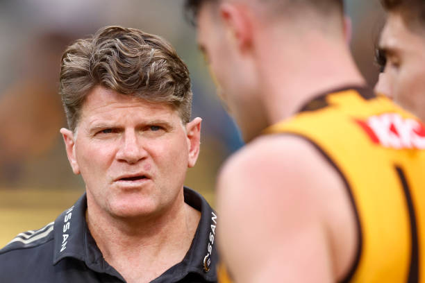 Hawthorn assistant coach Robert Harvey speaks with players during the round nine AFL match between the Hawthorn Hawks and the Richmond Tigers at...