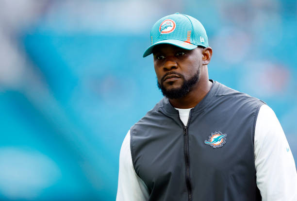 Head coach Brian Flores of the Miami Dolphins walks the field prior to the game against the New England Patriots at Hard Rock Stadium on January 09,...