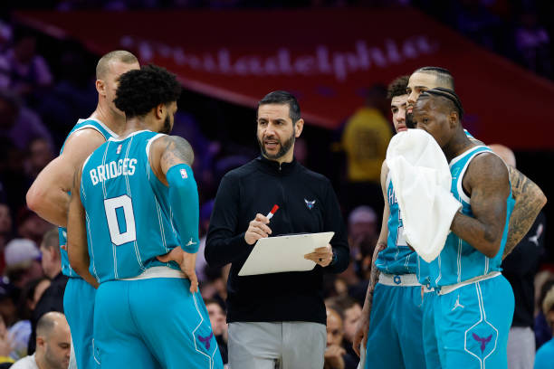 Head coach James Borrego of the Charlotte Hornets speaks with players during the third quarter against the Philadelphia 76ers at Wells Fargo Center...