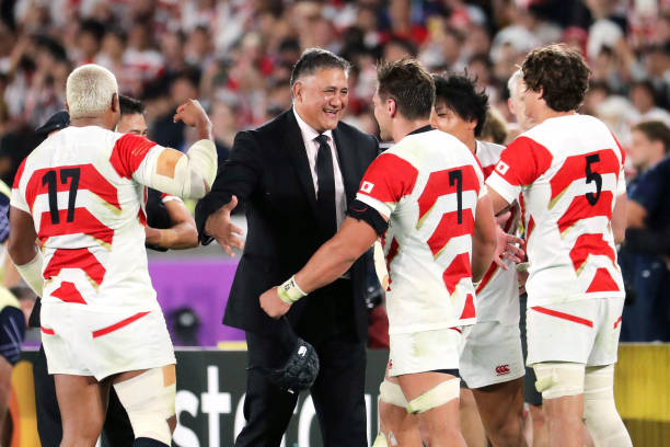 YOKOHAMA, JAPAN - OCTOBER 13: Head coach Jamie Joseph of Japan congratulates Pieter Labuschagne after their victory in the Rugby World Cup 2019 Group A game between Japan and Scotland at International Stadium Yokohama on October 13, 2019 in Yokohama, Kanagawa, Japan. (Photo by The Asahi Shimbun via Getty Images)