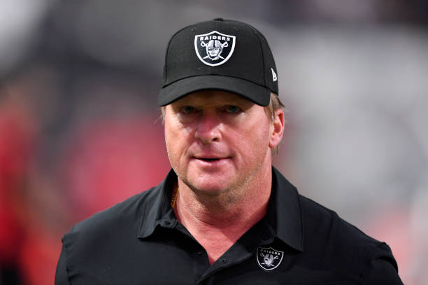 Head coach Jon Gruden of the Las Vegas Raiders exits the field during a preseason game against the Seattle Seahawks at Allegiant Stadium on August...