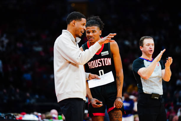 Head Coach Stephen Silas talks to Jalen Green of the Houston Rockets during the game against the Phoenix Suns at Toyota Center on November 14, 2021...